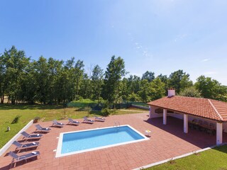 A fence around the pool ensures privacy