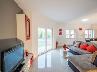 Upper floor living room with exit to the terrace