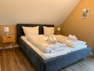 Schlafzimmer links im OG