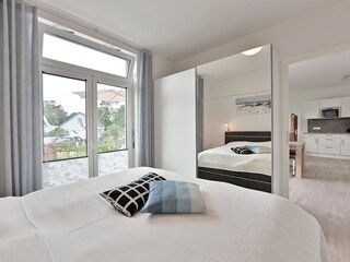 Schlafzimmer mit Doppelbett