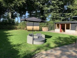 Holiday house Holiday home with covered porch and sauna - Voorthuizen - image1