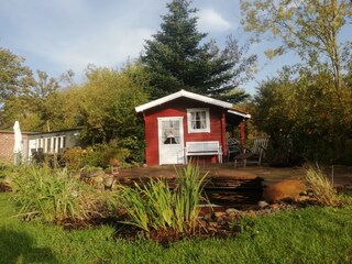 Garden sauna with pond