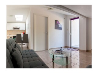 Wohnzimmer mit Küche