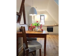 Dining Area and kitchen in the background