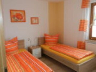 Schlafzimmer mit zwei Schlafplätzen auf Nachfrage