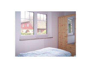 Schlafzimmer mit Doppelbett