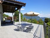 Sun-terrace (approx. 100 m²) with views of the lake