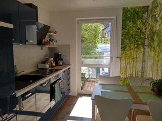 Kitchen with balcony facing the inner courtyard