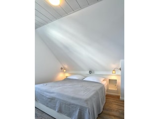 Das vierte Schlafzimmer befindet sich ebenfalls im 1. OG.
