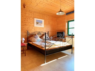 Ferienhaus Ostseezauber - Schlafzimmer mit Doppelbett