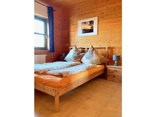 Ferienhaus Ostseezauber - Schlafzimmer mit Doppelbett