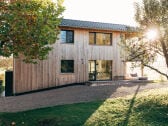 Ferienhaus Schmidhuber Westansicht im Herbst