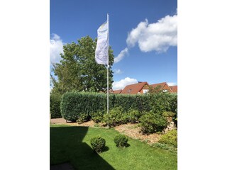 Richtungsweisend Flagge zeigen