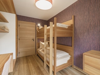 Das kleine Schlafzimmer mit Stockbett
