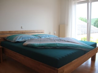 Schlafzimmer Obergeschoss mit Balkon