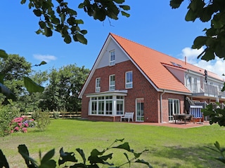 Captain's Südwestseite mit privatem Gartenbereich
