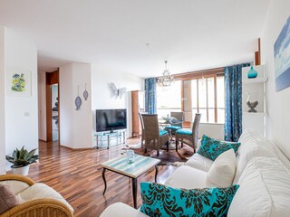 Living/dining room with exit to terrace