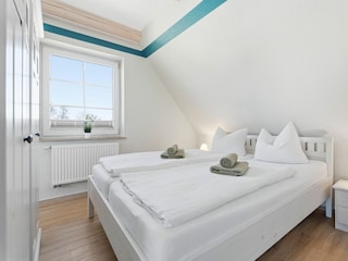 Schlafzimmer mit Doppelbett