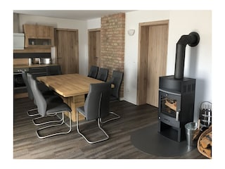 Wohnraum Essbereich mit Kamin