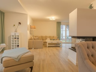 Ferienhaus Nautilus Relaxsessel und Kamin