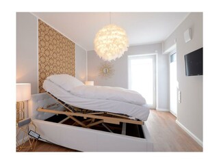 Strandvilla Gezeiten App. Goldrichtig-Schlafzimmer mit Doppelbett