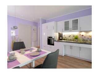 Strandvilla Gezeiten Appartement Deichlicht-gemütliche Wohnküche mit Essbereich