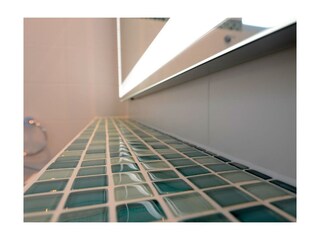 Strandvilla Gezeiten Appartement Deichlicht-Detailaufnahme Badezimmer