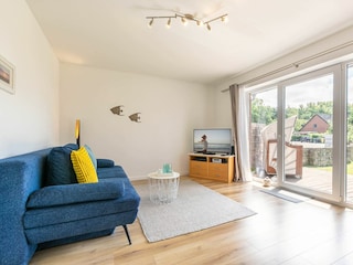 Wohnzimmer mit Südterrasse