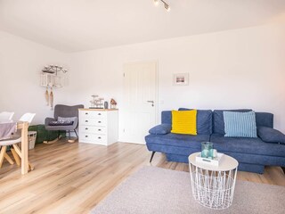 Wohnzimmer mit Schlafsofa