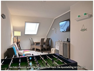 Spielzimmer mit Schlafsofa