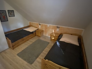 3 Schlafzimmer mit Einzelbetten zum Ausziehen