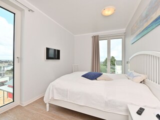 Schlafzimmer mit Doppelbett