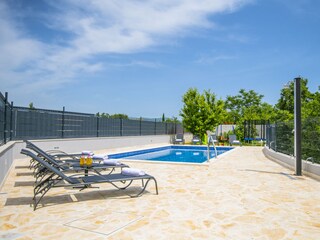 Maison de vacances Katuni Enregistrement extérieur 9