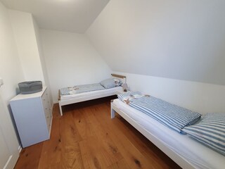 Schlafzimmer mit 2 Einzelbetten