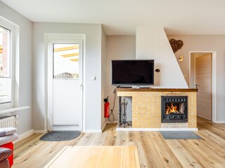 Wohnzimmer mit Kamin