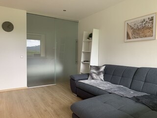 Living room with view of bedroom (sliding glass door)