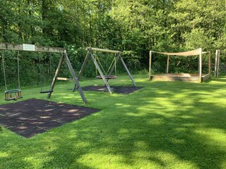 Children's playground with swings