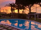 pool with sunset