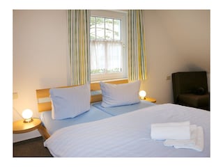 Doppelbett im Schlafzimmer