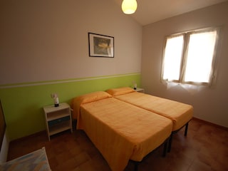 Schlafzimmer mit Doppelbett