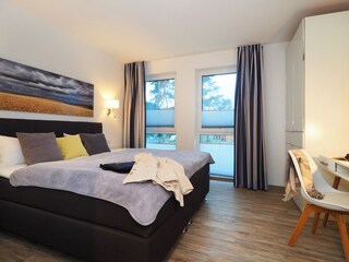 zweites Schlafzimmer mit TV