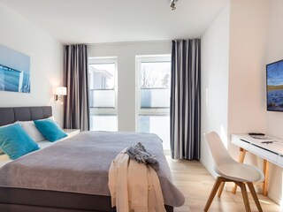 zweites Schlafzimmer mit TV