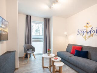 drittes Schlafzimmer mit Luxus-Schlafcouch und TV