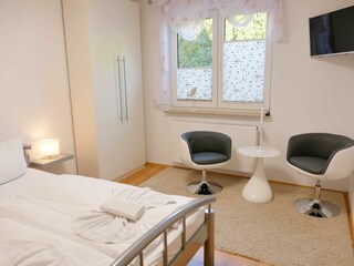 Schlafzimmer mit Sitzbereich
