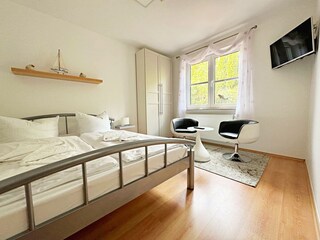 Schlafzimmer mit Sitzbereich