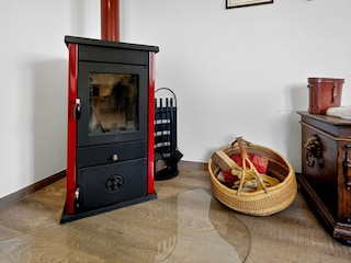 Altes Zollhaus Neukirchen Wohnzimmer Kaminofen