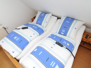 Schlafzimmer in der Ferienwohnung Seeschwalbe