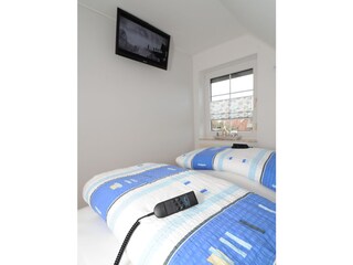 Schlafzimmer in der Ferienwohnung Seeschwalbe