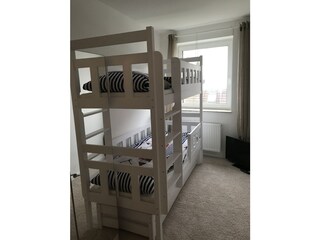 Schlafzimmer mit Hochbett