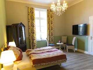 Grünes Schlafzimmer